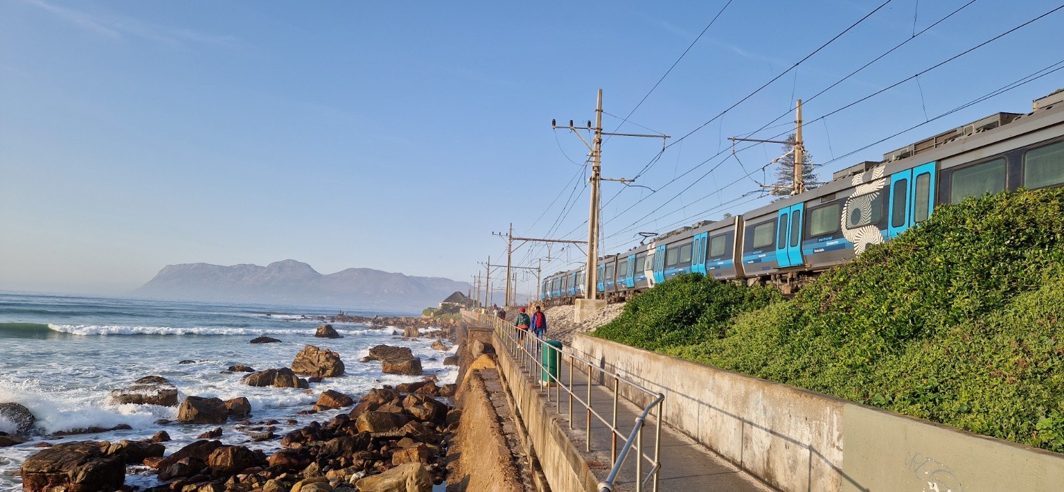 Muizenberg coastal railway Metrorail Southern Line coastal train running along the False Bay shoreline between Muizenberg and Kalk Bay, Cape Town