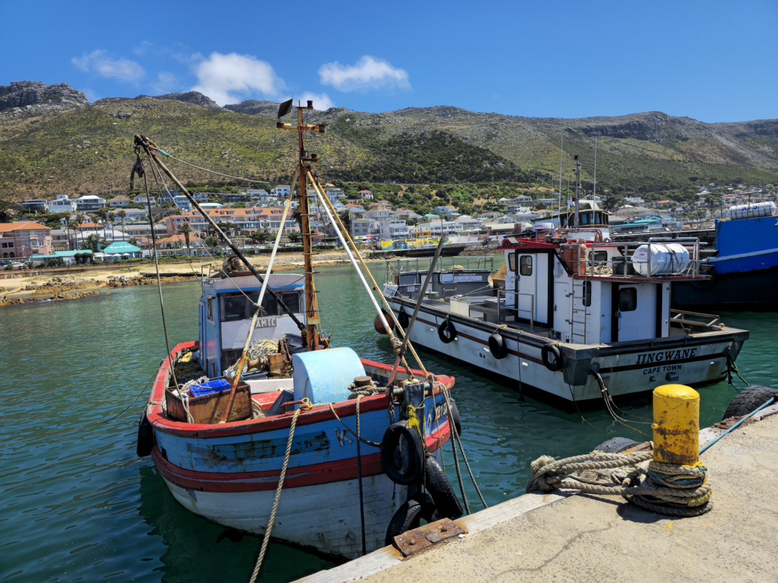 Elevated view over Kalk Bay Harbour and village rooftops from the climb up towards Boyes Drive, Cape Town