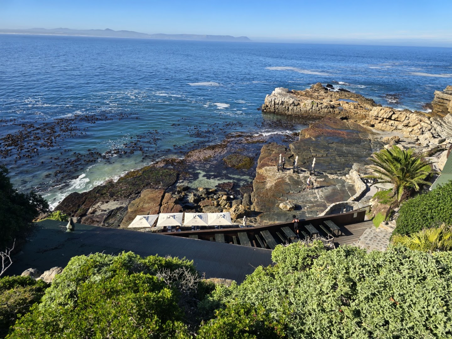 Tidal pools and rocky outcrops below the Hermanus Cliff Path